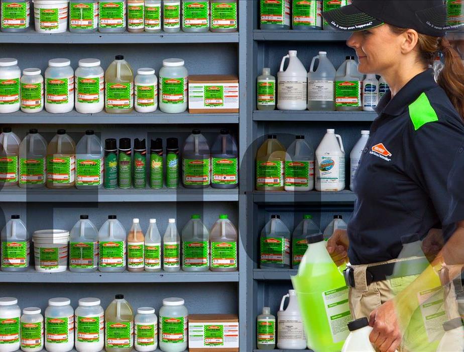 SERVPRO Employee hard at work with cleaning supplies in hand
